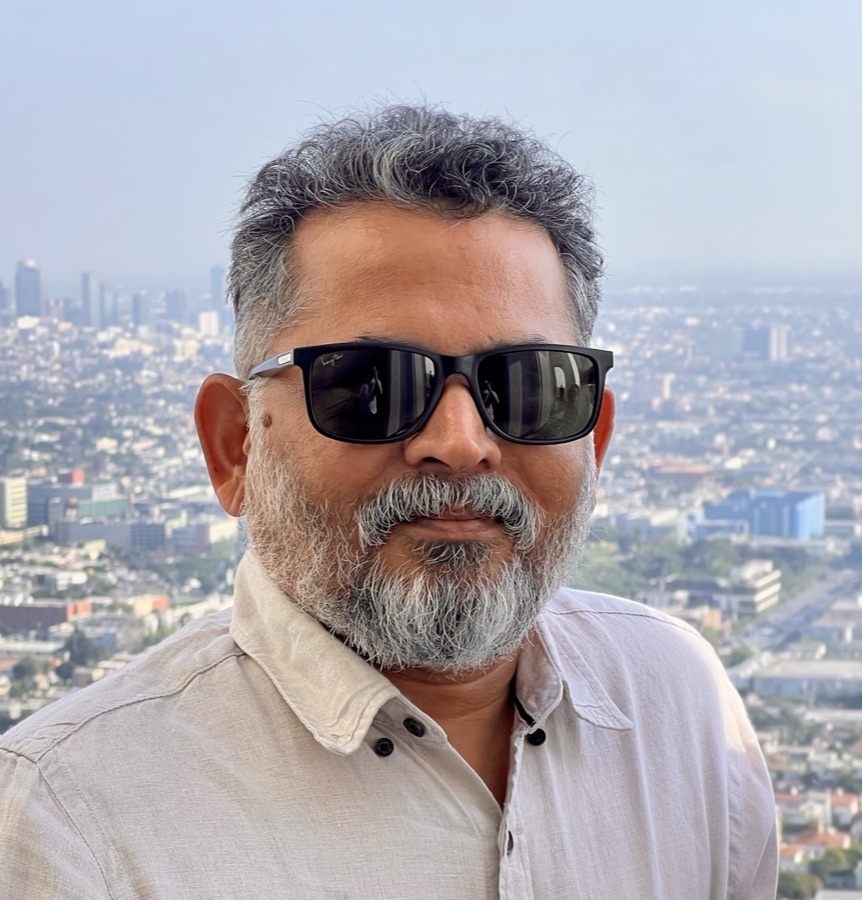 Portrait of Manish Patil, owner of Plus Medical & General Store
